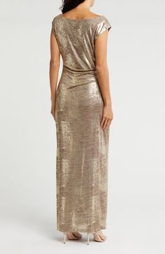 Show off captivating shine in this foiled jersey dress fashioned with a elegantly draped cowl neck and gracefully gathered waist. 58" length Slips on over head Cowl neck Sleeveless Lined 95% polyester, 5% spandex Hand wash, dry flat Imported Gold Ruched Draped Dress, Gold Draped Ruched Dress, Glamorous Draped Metallic Dresses, Gold Fitted Draped Dress, Metallic Ruched Sleeveless Dress, Metallic Sleeveless Ruched Dress, Sleeveless Shimmer Maxi Dress For Gala, Glamorous Draped Maxi Dress With Ruched Details, Fitted Sleeveless Shimmer Maxi Dress