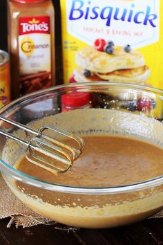 a bowl filled with batter next to other ingredients