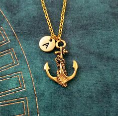 "This listing is for a personalized anchor keychain with a hand-stamped initial charm. We can also make this into a necklace instead, just choose your chain length from the drop-down menu. You will be able to choose between a key ring, link chain, or ball chain when checking out. You will also be able to choose your initial! :) **Please see the second picture for scale. This keychain is made of pewter and steel. The initial charm measures 3/8\". **Please note that this is gold-tone and not actua Anchor Keychain, Boyfriend Keychain, Small Anchor, Long Distance Relationship Gift, Anchor Jewelry, Distance Relationship Gifts, Long Distance Relationship Gifts, Anchor Pendant, Anchor Charm