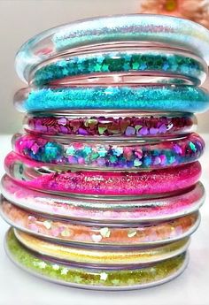 a stack of bracelets sitting on top of each other