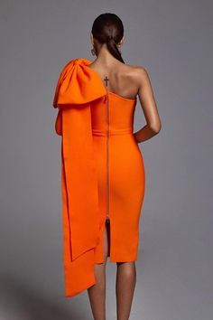 In a one-shoulder silhouette with ruffled details, this midi dress offers chic style for any special occasion or night out on the town. The Abbey One Shoulder Bandage Dress features a sleeveless bodice on one side with a one shoulder neckline, one long bow topped draped cape sleeve, and a center back slit. The tight bodycon fit lets you flaunt your curves from every angle. Materials: Bandage (90% Rayon, 9% Nylon, 1% Spandex) Care on reverse Model wearing size S Model Stats: Height - 5.7"/174cm Long Bow, Asymmetrical Midi Dress, One Shoulder Midi Dress, Bandage Midi Dress, Stylish Clothes For Women, Classy Dress, Bandage Dress, Dress With Bow