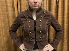 "Vintage 90s Brown Jacket Ashley by 26 International Colonial Button Style Steampunk This 98% cotton jacket (2% spandex) has a stand-up collar, with colonial style buttons and hided hooks and eyes.   The jacket is unlined.  Size: Medium Chest: 34\" Waist 30\" Shoulder to hem: 20\" Sleeve: 23\" Machine wash cold, line dry  Bear in mind vintage items are 20-40 years and have been used.  It is in excellent vintage condition. All items in my shop, Simprov, sewing improvisations were curated by mysel 1950’s Style, Style Steampunk, Womens Jackets, Button Style, Colonial Style, Brown Jacket, Vintage Clothes, Cute Packaging, Cotton Jacket