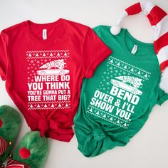 Bend Over and I'll Show You matching Christmas couple T-shirts! Inspired by the fun of Christmas Vacation, these cute and cozy shirts feature a festive Christmas tree design perfect for family gatherings, holiday photos, or just spreading cheer together. A great gift for couples or families who love to celebrate the season with a little humor! Available in various sizes for everyone. We specialize in creating unique, custom-designed apparel for everyone, using high-quality DTF (Direct-to-Film) p Christmas Vacation Shirt, Christmas Vacation Shirts, Cute Christmas Tree, Christmas Tree Design, Christmas Couple, Family Shirt, Couple Matching, Christmas Vacation, Couple T-shirt