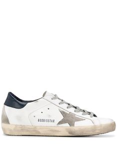 Blue/white leather Superstar distressed-finish sneakers from Golden Goose featuring distressed finish, logo print to the side, signature star patch to the sides, contrasting heel counter, round toe, front lace-up fastening and flat rubber sole. Mint Green Heels, White Leather Sneakers Men, Sneaker Displays, Leopard Print Boots, Basket Vintage, Green Heels, Designer Trainers, White Leather Sneakers