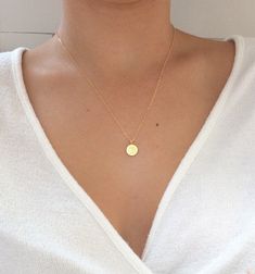 "Om Necklace, Yoga Jewelry, Coin Necklace, Inspirational necklace, Gold Coin Necklace, dainty gold necklace, gold necklace, disc necklace ♥Beautiful and delicate om necklace for the yoga lover in your life ♥Wear this necklace alone or layer it with your favorites. ♥A delicate 14k gold filled chain, with a hint of shimmer adorned with a gold vermeil disc pendant ♥What is vermeil? 22k Gold plated over 925 Sterling Silver ♥Pendant measures 10mm ♥LENGTH - The necklace shown in picture #2 is 18\" lon Gold Dainty Medallion Necklace For Everyday, Dainty Gold Medallion Necklace For Everyday, Dainty Medallion Necklace For Everyday, Dainty Medallion Necklace With Adjustable Chain, Dainty Gold Medallion Necklace, Gold Minimalist Medallion Necklace With Delicate Chain, Gold Medallion Necklace With Delicate Chain In Minimalist Style, Delicate Gold Coin Necklace For Everyday, Minimalist Gold Medallion Necklace With Initial Pendant