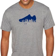 New York Running T-shirt Highlighting The New York City skyline within the Running Shoe design. Whether its training for a Marathon, 5K or just jogging down the street, this is the perfect NYC gift for your son, daughter, husband, wife, friend or anyone else that you know who loves running. RUNNYC NYC RUN © 2018 Folk That, LLC Breathable Casual T-shirt For Sports Events, Casual Crew Neck T-shirt For Running, Casual Running T-shirt, Casual Athletic Fit T-shirt For Running, Athletic Heather Short Sleeve T-shirt For Running, Urban Moisture-wicking Sports T-shirt, Breathable Casual T-shirt For Running, Casual Breathable T-shirt For Running, Casual Go-dry T-shirt For Streetwear