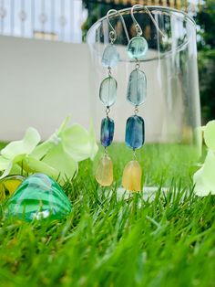 These Fluorite Earrings are Long and Light Weight. Perfect for Weddings, dates, and evening outs! ABOUT JEWELS BY NIMISHA : Jewels by Nimisha is a dream of its owner Nimisha Agarwal. All the designs are handmade with lots of love and personal attention to detail. Each order is much valued and packaged carefully in a transparent box prioritizing its safe delivery. You can browse the shop to see all the available items, or if there's something specific you're searching for, just get in touch. I will always go the extra mile to find what you need! All the designs are handmade in Jaipur, India, which is known as the hub of gemstones across the world. Hence, only fine quality gemstones are handpicked which are 100% authentic. As gemstones are natural, please allow for different inclusions, mark Silver Long Earrings, Transparent Box, Gold Piece, Wedding Jewelry Earrings, Wedding Earrings, Long Earrings, Semi Precious Gemstones, Earrings For Women, Gemstone Earrings