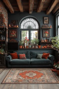 a living room filled with furniture and lots of plants