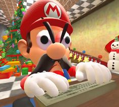 mario kart is typing on a keyboard in front of a christmas tree and snowman