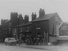 an old black and white photo of some buildings