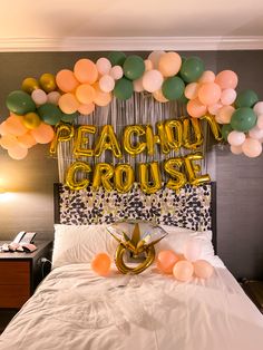 a bedroom decorated with balloons and streamers