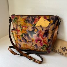 Brand New Hard To Find Patricia Nash Crossbody Shoulder Bag Purse Genuine Leather Rainforest Multicolor Floral Design Adjustable Long Strap 21”- 24” Drop Exterior: Two Big Pockets With Magnetic Snap Closure Two Small Side Pockets Zipper Closure On The Top Interior: One Zip Pocket & Two Slip Pockets Approximately 9.5”-12”L 9.5”H 3”W Dust Bag Is Available By Request Gorgeous Durable Purse!! Made In Italy Pet & Smoke Free Home Please See My Entire Collection Multicolor Fall Shoulder Bag For Everyday Use, Multicolor Everyday Bag For Fall, Multicolor Bags With Leather Handles For Fall, Multicolor Leather Handle Bags For Fall, Fall Multicolor Bags With Leather Handles, Multicolor Leather Lined Bags For Daily Use, Multicolor Tote Bag With Leather Lining, Multicolor Leather Pouch Satchel, Multicolor Leather Lined Tote Bag