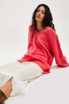 Keep it cozy in this chic pullover, featured in a soft wool-blend and slouchy silhouette with a deep V-neckline and raglan-cut sleeves. **Fit:** Slouchy, oversized fit **Features:** Soft wool-blend, deep V-neckline, raglan-cut long-sleeves, ribbed hems, defined seam detail **Why We ❤ It:** Made to be layered up or down, this pullover is one you’ll reach for over and over again. | One And Only Pullover by Free People in Red, Size: S Red Fits, Floral Shoes, Free People Sweater, Soft Wool, Ribbed Sweater, Knitwear Women, One And Only, Boho Outfits, Print Tops