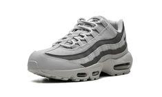 The Nike Air Max 95 “Grayscale” is a versatile colorway of the retro running and lifestyle sneaker.  The Air Max 95 debuted back in the mid-1990s and is now one of Nike’s most essential sneakers.  On the “Greyscale” colorway, the shoe undergoes a makeover in the name of versatility.  It features a grey mesh upper with black and grey wavy leather overlay panels on the sides.  A small black Swoosh can be seen on the collar while “Air Max” branding is found on the tongue.  Underfoot, visible Air un Nike Air Max Gray Streetwear Shoes, Gray Air Max Cushioned Running Shoes For Streetwear, Gray Air Max Running Shoes For Streetwear, Gray Running Shoes With Air Max Cushioning For Streetwear, Gray Nike Air Max Low-top For Streetwear, Gray Low-top Nike Air Max For Streetwear, Nike Air Max Sporty Gray, Sporty Nike Air Max In Gray, Sporty Gray Low-top Nike Air Max