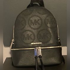 Michael Kors Black Backpack With Adjustable Straps Michael Kors Black Bag With Zipper Closure, Michael Kors Black Travel Backpack, Michael Kors Black Backpack For Travel, Michael Kors Black Backpack For Everyday, Michael Kors Black Standard Backpack, Michael Kors Black Everyday Backpack, Everyday Michael Kors Black Backpack, Michael Kors Backpack, Bags Michael Kors