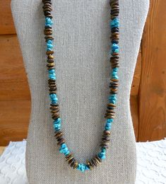 This 27 inch southwestern necklace is made from golden brown tiger's eye freeform rondelle beads, turquoise nugget beads, and shell heishi beads. It has a silver hook and eye clasp with shell heishi in between the beads and at the ends of the necklace. This is a Native American inspired necklace. The matching earrings are included in the set. Brown and turquoise look beautiful together! Southwestern Necklace, Brown And Turquoise, Dove Necklace, Brown Tiger Eye, Inspired Necklace, Silver Wings, Heishi Beads, Lovely Necklace, Amethyst Necklace