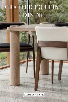 a table and chairs with the words crafted for fine dining