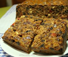 several slices of fruit cake on a white plate