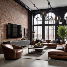 a living room with large windows and leather couches in front of a flat screen tv