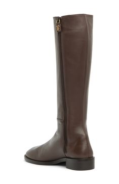 Complete your ensemble in style with this tall leather boot that easily pair with anything in your wardrobe. 15.25" shaft height, 12" opening circumference 1.25" heel Round toe Inner zip closure Leather upper/synthetic sole Made in Spain Tall Leather Mid-calf Boots With Medium Width, Leather Mid-calf Boots With Medium Width, Leather Mid-calf Boots Medium Width Tall, Mid-calf Leather Boots With Medium Width, Brown Leather Tall Knee-high Boots, Brown Leather Knee-high Boots, Medium Width Leather Knee-high Boots, Leather Knee-high Boots For Fall, Brown Leather Mid-calf High Boots