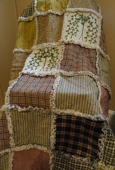 a blanket made out of old patchwork material