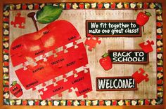 an apple themed bulletin board with words and pictures