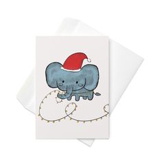 an elephant with a santa hat on its head