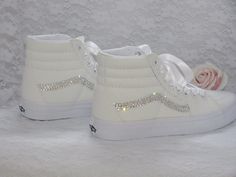 Perfect wedding sneakers to dance the night away in. Very comfortable and super sparkly. Once the day is over, wear them again and again for that added touch of luxury with any outfit. Custom hand embellished platform Old Skool Vans. Embellished with the finest crystals to inner and outer brand panels and finished with luxurious satin ribbon lace ties. These can be personalised on request and ribbon colour changed to compliment your colour scheme. Please just ask. As with all our ranges, if you wish to modify a design we can work with you to cater for your individual requirements. All shoes are authentic and made to order. **PLEASE NOTE** Orders are taken in UK sizes. An International Converse sizing conversion chart is included in the listing for reference. Please make sure you order your Vans Wedding, Wedding Sneakers For Bride, Crystal Sneakers, Bling Sneakers, Wedding Vans, Bridal Converse, Bridal Sneakers, Old Skool Vans, Tenis Vans