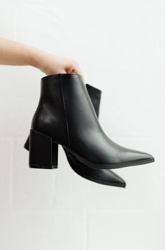 The Amari Ankle Boots are so chic and cute you'll want to wear them with every outfit! In a stunning faux leather, shaped from a pointed toe, and ankle length silhouette, these boots were made for walking! Faux leather + Pointed Toe Heel height: 2 1/2" Shoe height: 5" Zipper length: 5" Keywords: Ankle Boots, Pointed Toe, Black Boots Black 7, Black Ankle Boots, Ankle Length, Black Boots, Bootie Boots, Blue Denim, Heel Height, Shoe Boots, Ankle Boots