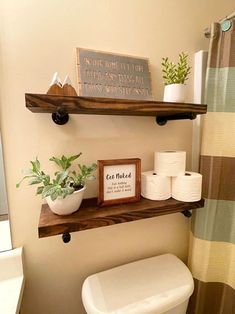 This floating shelf is the perfect addition to your home décorThese shelves work great on any wall in your homeUse in your bathroom over a toiletdisplay your favorite beverages in your kitchenuse as an entry way shelf over a tableor any wall to display your home décorEach piece of wood is hand cut from quality pine woodsandedand stained to your stain selection*Shelf depth is 7.25 inchesThis listing includesOne shelf of your size selectiontwo pipe brackets and mounting hardwareincluding drywall Rustic Bathroom Accessories, Shelves Above Toilet, Dekorere Bad, Shelf Farmhouse, Rustic Bathroom Shelves, Farmhouse Shelf, Bathroom Shelf Decor