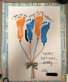 a birthday card with three handprints on it