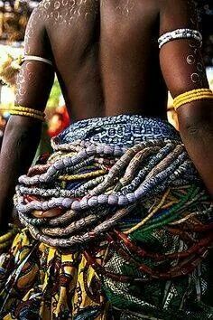 a man with many bracelets on his back