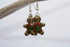 Adorable Gingerbread Earrings, Gingerbread Jewelry, Christmas Earrings, Christmas Jewelry, Food Earrings, Ginger Bread Man, Fun Earrings, Cookie Earrings, Gifts from Hawaii, Handmade on Maui by U'i Jewelry D E T A I L S * Style: Gingerbread Earrings * Earring Length: 1.5 inches (including ear wires). See last photo for size comparison * Material: Enamel and silver plated components. * Ear Wires: Silver plated Your newest pair of holiday earrings can be customized with your choice of ear wires, b Novelty Christmas Jewelry For The Holidays, Novelty Christmas Holiday Jewelry, Christmas Holiday Novelty Jewelry, Cute Christmas Gift Earrings, Cute Christmas Festive Jewelry, Cute Christmas Holiday Jewelry, Cute Handmade Christmas Jewelry, Cute Handmade Jewelry For Christmas, Cute Handmade Christmas Earrings