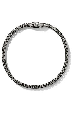 Medium-sized sterling-silver links bring understated shine to your ensemble with this gleaming box-chain bracelet masterfully crafted in the USA. 8" length Lobster clasp closure Sterling silver Made in the USA Classic Sterling Silver Box Chain Bracelet, Classic Sterling Silver Bracelet With Oval Link Box Chain, Classic Formal Chain Bracelet With Oxidized Finish, Classic Oxidized Finish Chain Bracelet For Formal Events, Classic Oxidized Finish Chain Bracelet For Formal Occasions, David Yurman Mens, David Yurman, Box Chain, Chain Bracelet