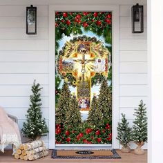 a door decorated with christmas wreaths and an image of jesus christ on the cross