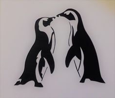 two black and white penguins kissing each other on a white background, with one penguin facing the other way