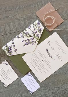 the wedding stationery is laid out and ready to be put into their guests'envelopes