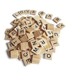 wooden scrabbles with letters spelling out the word love