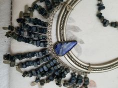 Vintage Peruvian Lapis Silver Bib Style Necklace,, lovely craftsmanship.. each stone is linked with silver wire and a nice Lapis stone inlaid in silver ornate metal is the center pieces.. shorter style necklace.. 15 inches Bohemian Sterling Silver Stone Necklaces, Festival Silver Jewelry With Stones, Bohemian Silver Beaded Gemstone Necklace, Silver Wire Wrapped Bohemian Necklaces, Silver Wire Wrapped Bohemian Necklace, Silver Beaded Necklaces With Natural Stones, Bohemian Metal Necklaces With Stones, Silver Bohemian Beaded Necklace With Natural Stones, Bohemian Silver Beaded Necklace With Natural Stones