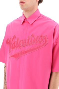 Oversized short-sleeved cotton faille shirt by Valentino, personalized with an embroidered logo patch on the front. Boxy cut with pointed collar and covered button fly. The model is 187 cm tall and wears a size 39. Size Info CM Color Detail Fuchsia Made In Italy Material 100% CO Season One spring Season Two summer Product clothing Brand Valentino Size And Fit Valentino Pink, Bowling Shirt, Latest Fashion Design, Bowling Shirts, Fuchsia Color, Pink Tshirt, Spring Season, Roberto Cavalli, Victoria Beckham