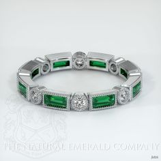 Luxury Classic Design Jewelry For Wedding, Luxury Classic Jewelry For Wedding, Luxury Classic Wedding Jewelry, Formal Classic Platinum Jewelry, Luxury Formal Jewelry With Decorative Band, Elegant Baguette Cut Emerald Wedding Ring, Luxury Platinum Jewelry With Decorative Band, Timeless Green Wedding Dress For Formal Occasion, Formal Platinum Wedding Ring With Halo