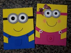 two paper bags made to look like minion characters