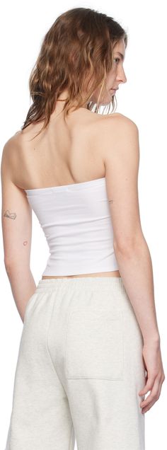 Stretch cotton jersey tube top. · Straight neck · Converts to skirt Supplier color: White Fitted Cotton Tube Top For Spring, Stretch Cotton Bandeau Tank Top, Stretch Cotton Tube Top For Spring, Fitted Cotton Sleeveless Tube Top, Fitted Seamless Cotton Tube Top, Casual Stretch Cotton Tube Top, Spring Cotton Stretch Tube Top, Seamless Cotton Tube Top For Spring, Spring Seamless Cotton Tube Top