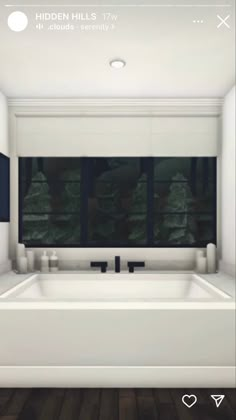 a white bath tub sitting next to a window