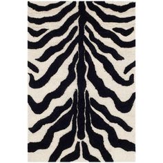 an animal print rug with black and white stripes