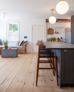 the kitchen is clean and ready to be used as a living room or dining area