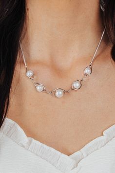 Our freshwater pearl 5 station necklace is a beautiful addition to any collection. This versatile piece can be dressed up or dressed down for any occasion.