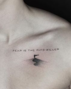 a man's chest with the words fear is the mind killer written on it