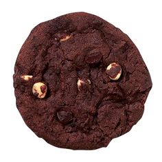 a close up of a chocolate cookie with nuts