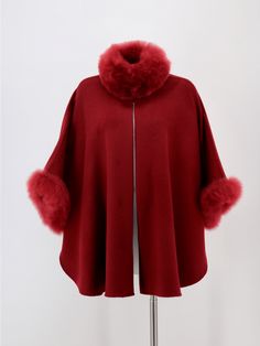 Crafted in sumptuous baby alpaca blend and lightly brushed for softness, our classic cape is an exquisite outerwear piece to complement any wardrobe. A short swing silhouette, perfect to dress up or wear with skinny jeans & boots. Product Details: 80% Baby Alpaca / 20% wool Top front button concealed Unlined Approximate length from shoulder: Short: 27 inches (ca. 69 cm) Long: 32 inches (ca. 81 cm) Dry clean only Made in Peru Luxury Wool Cape For Winter, Luxury Wool Winter Cape, Elegant Cashmere Winter Cape, Elegant Alpaca Outerwear For Fall, Luxury Winter Poncho, Elegant Wool Capelet For Winter, Elegant Alpaca Outerwear For Winter, Elegant Wool Poncho For Winter, Elegant Winter Cape